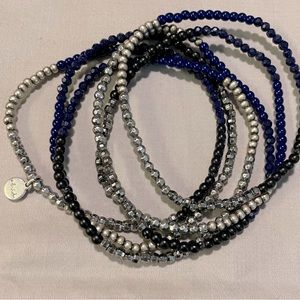 Stella and Dot 6 strand elastic beaded bracelet, black, blue and silver.